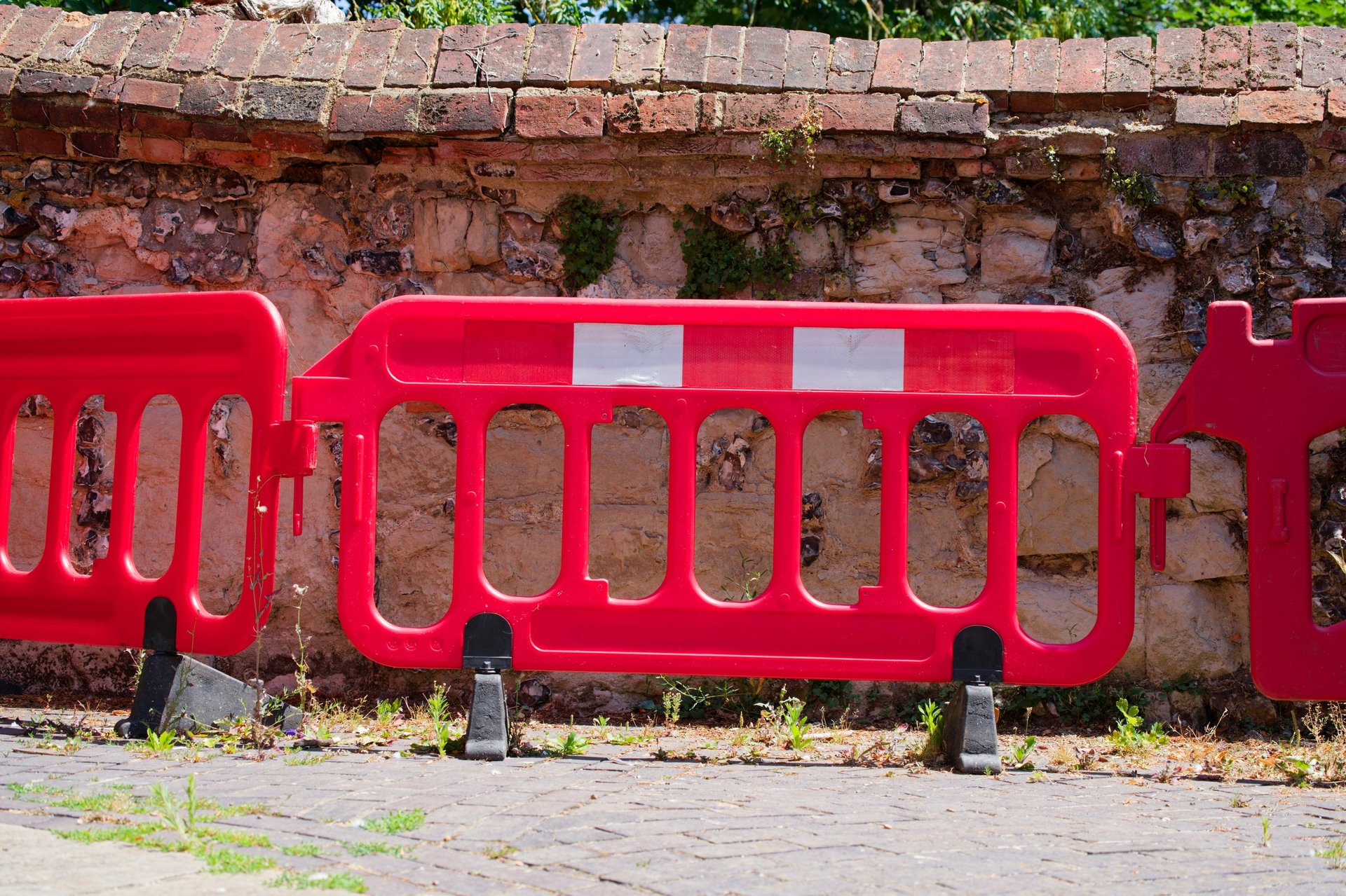 Safety barrier and site equipment at a construction site