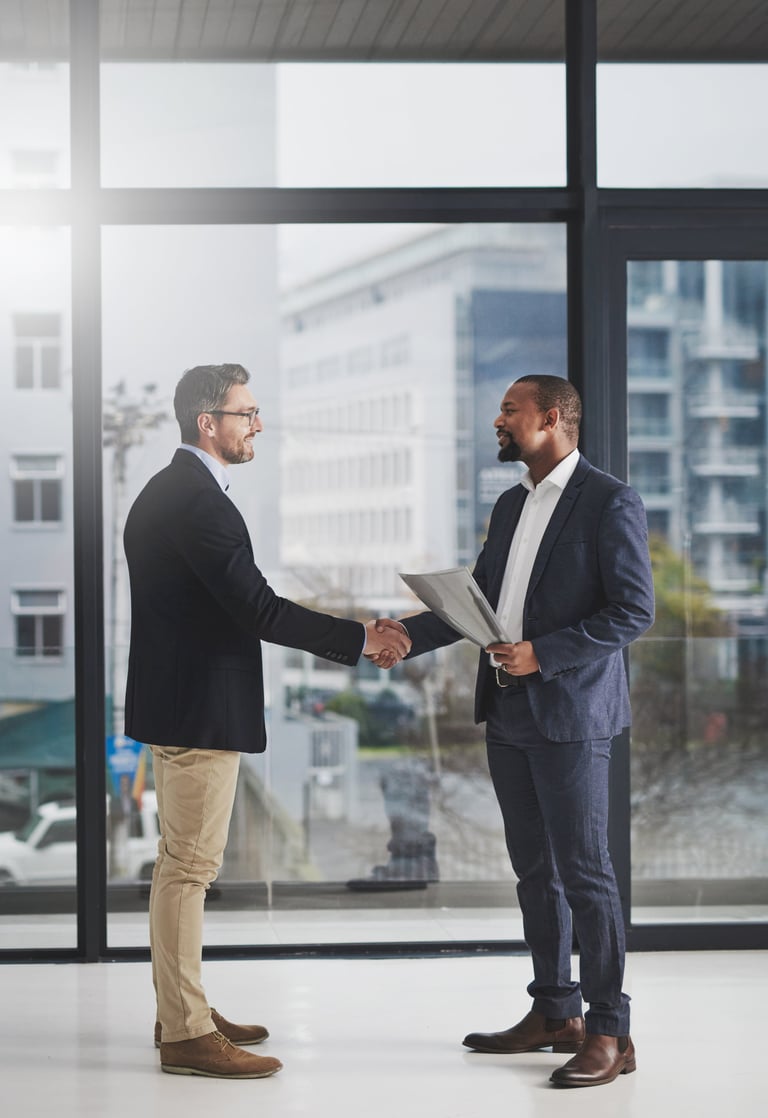 Two business professionals shaking hands