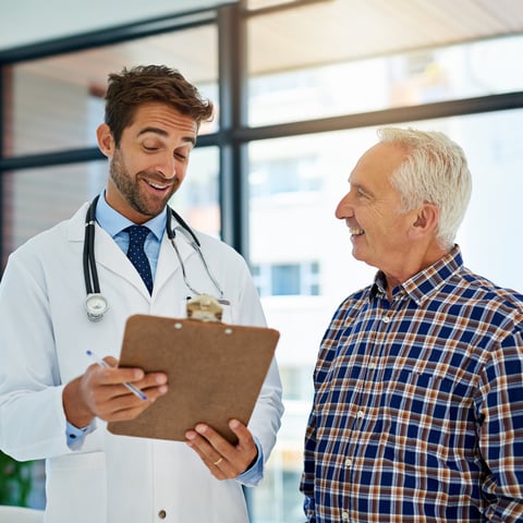 Doctor sharing good news with patient