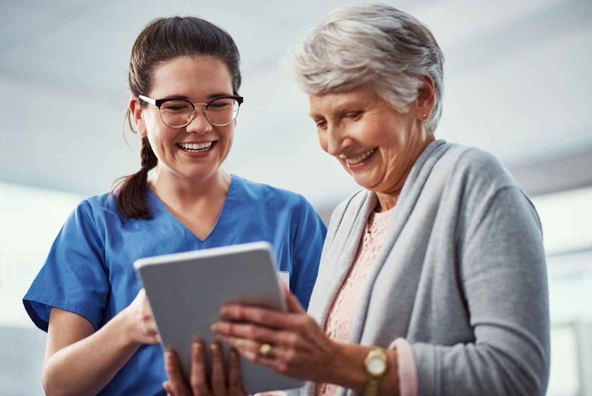 Nurse and senior patient working through therapy together