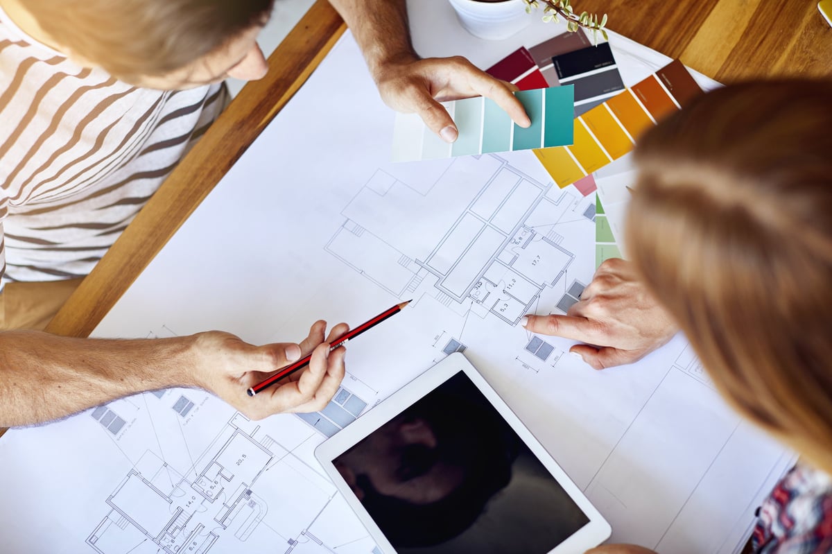 Homeowners comparing a HELOC and a cash-out refinance to access home equity