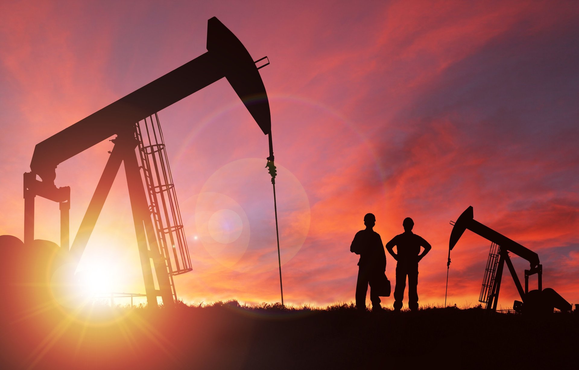 Oil pump jacks at sunset