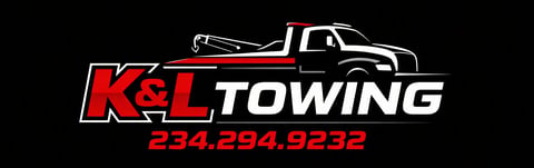K&L Towing logo with a white tow truck silhouette and phone number 234.294.9223