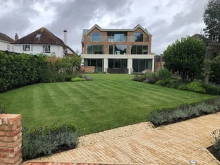 Manicured lawn with hedges