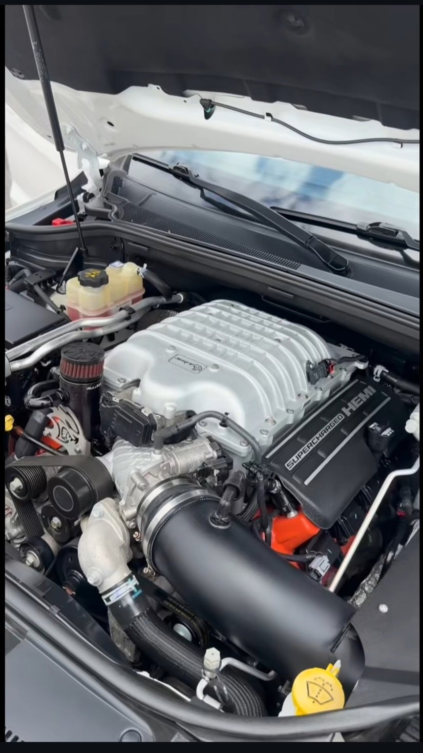 Supercharged V8 engine bay with polished intake manifold