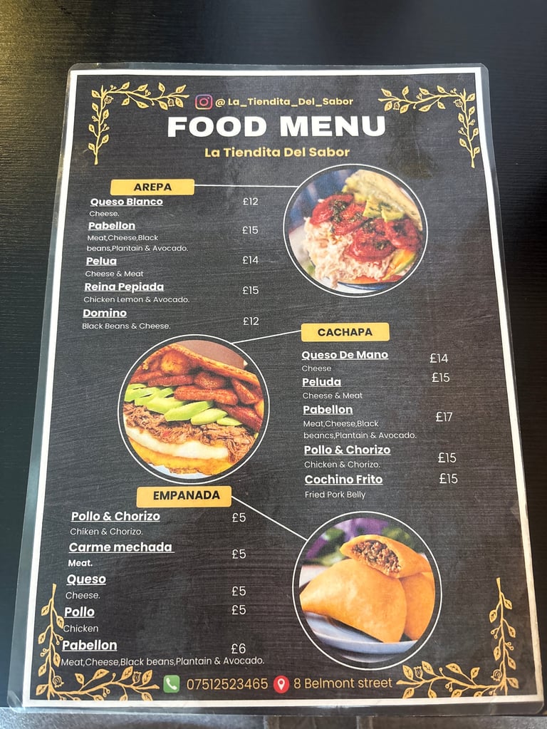 Food menu for La Tiendita Del Sabor restaurant featuring Colombian dishes like arepas, empanadas, and cachapa with prices in pounds