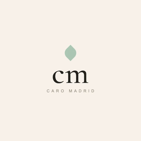 CM Caro Madrid luxury fashion brand logo with green diamond symbol on beige background