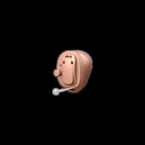 Beige behind-the-ear hearing aid device with controls and battery compartment visible