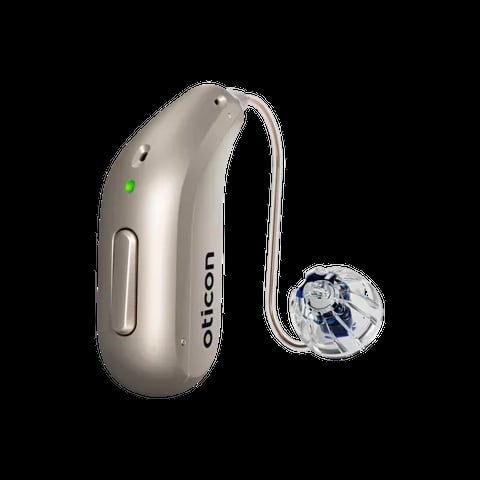 Beige Oticon hearing aid with curved design and transparent earpiece against black background