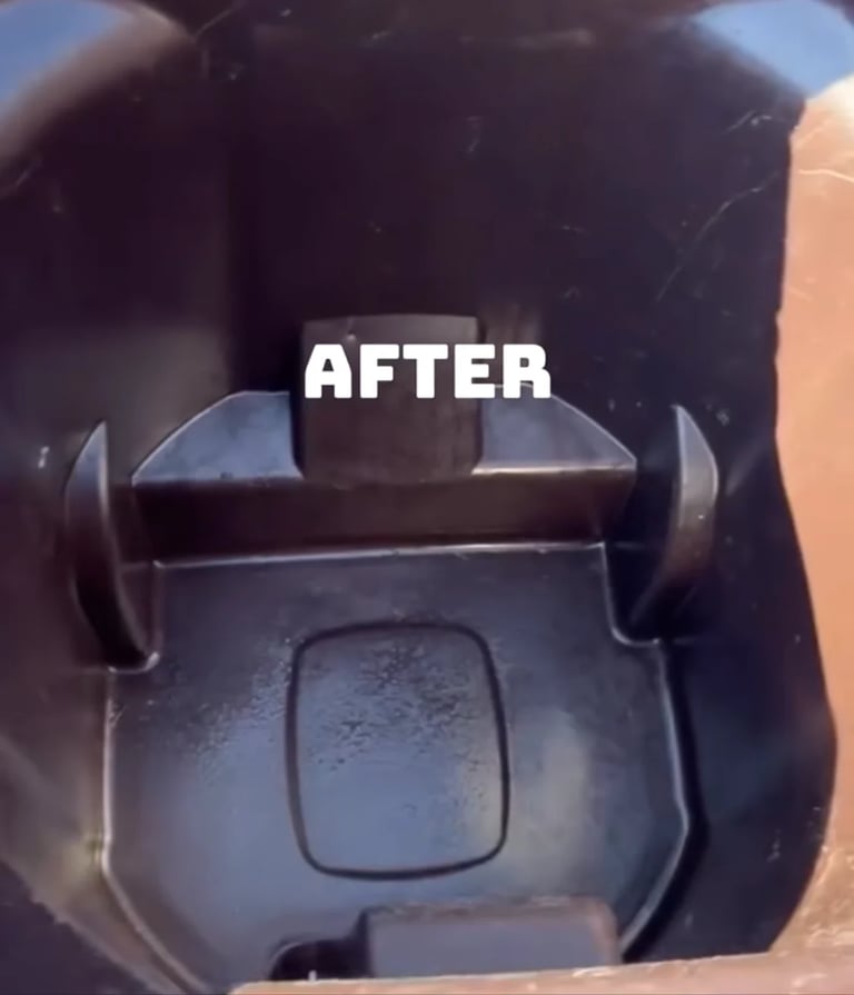 Clean dark gray trash can interior after professional cleaning, looking fresh and sanitized