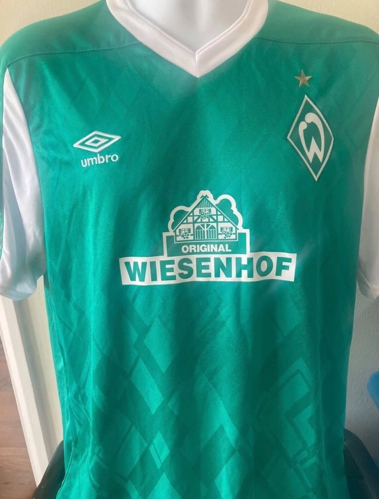 Werder Bremen home football shirt 2020/21 on a mannequin