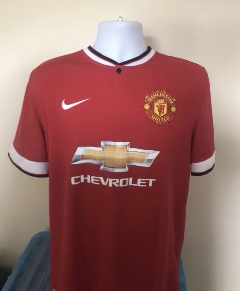 Manchester United home football shirt 2014/15 on a mannequin
