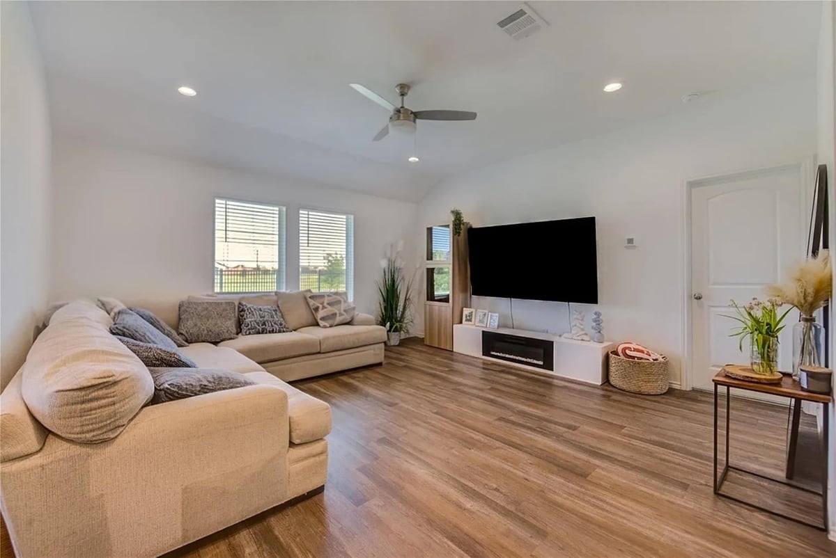 Beige Sectional with Wall TV