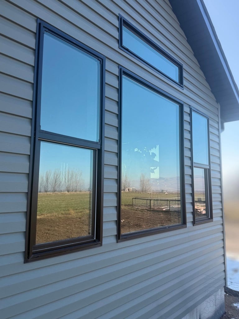 Modern energy-efficient residential replacement windows installed by HWY 38 Glass on a home in Northern Utah