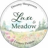 Luxe and Meadow logo for Dreamy Sleepovers and Luxury Picnics featuring watercolor wildflower meadow and forest landscape