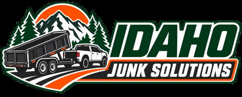 Idaho Junk Solutions logo — pickup truck with attached dump trailer, mountains, and pine trees on an orange and green background