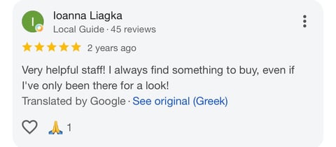 Five-star Google review by local guide Joanna Liagka praising helpful staff and selection