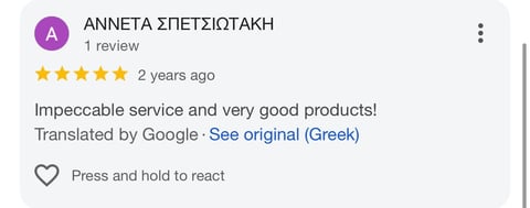 5-star review from Anneta Spetsioti praising impeccable service and products, posted 2 years ago