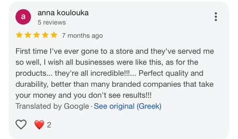 5-star customer review by Anna Koulouka praising store service and product quality from 7 months ago