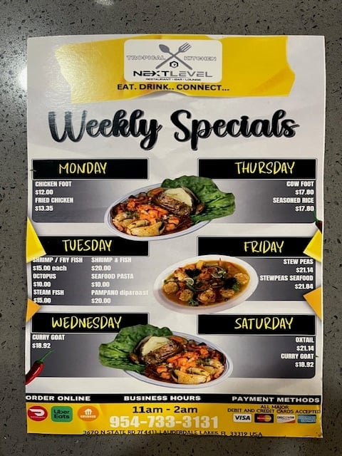Next Level restaurant weekly specials menu featuring daily dishes like chicken foot on Monday, shrimp fish on Tuesday, and stew peas on Friday