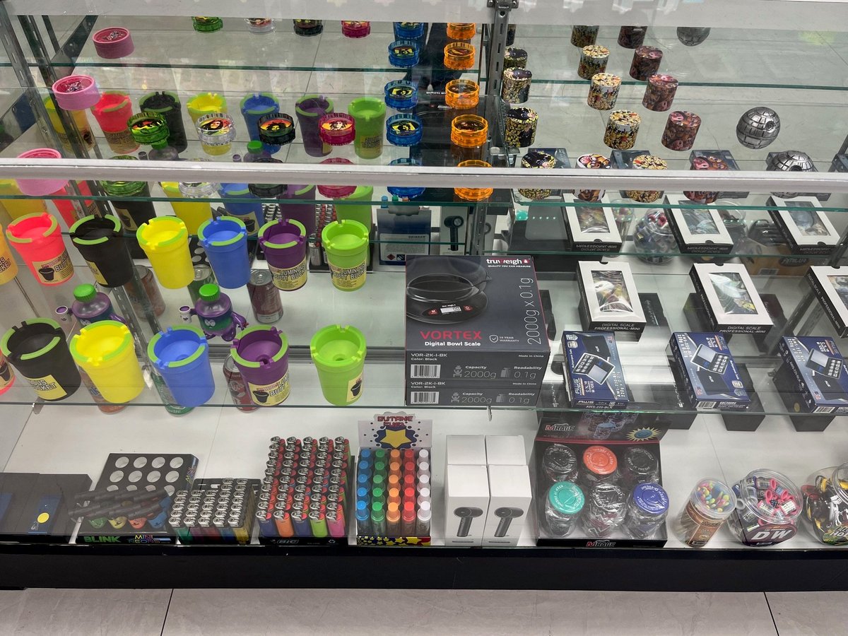 Retail display counter showcasing products organized on shelves and counter surface