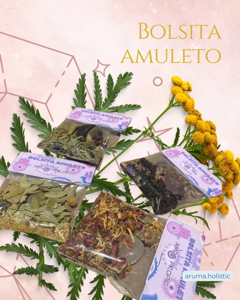 Bolsita Amuleto product display with dried herbs, yellow flowers, and labeled sachets on pink background