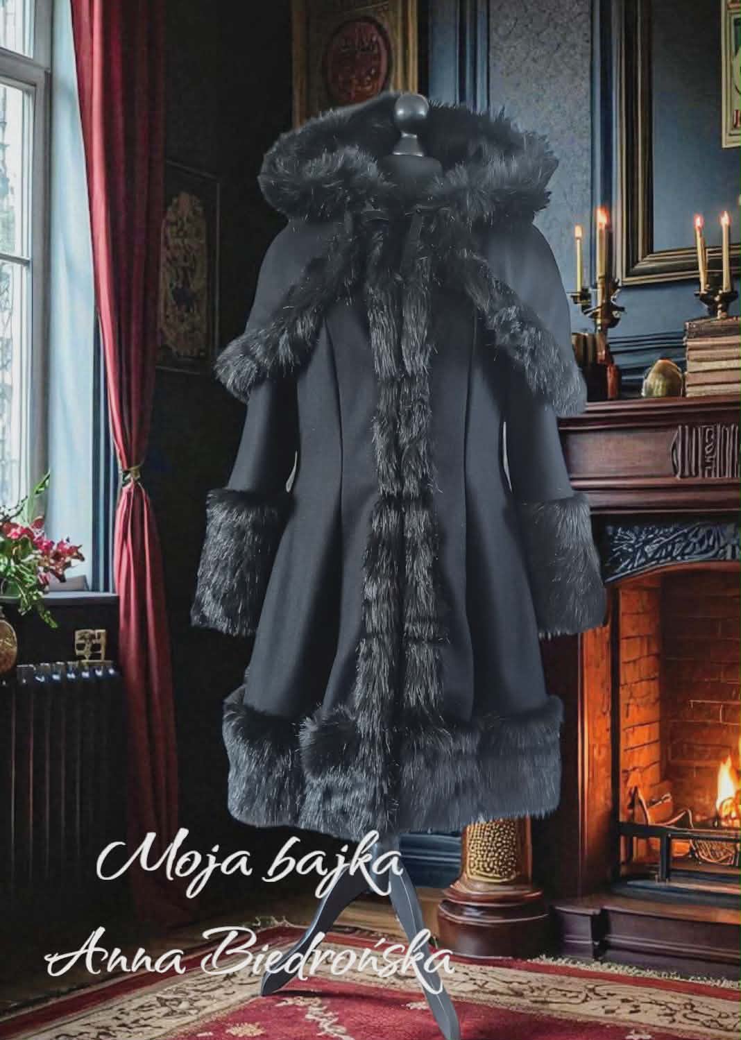 Black formal coat with fur collar and cuffs displayed on a mannequin in an elegant fireplace room