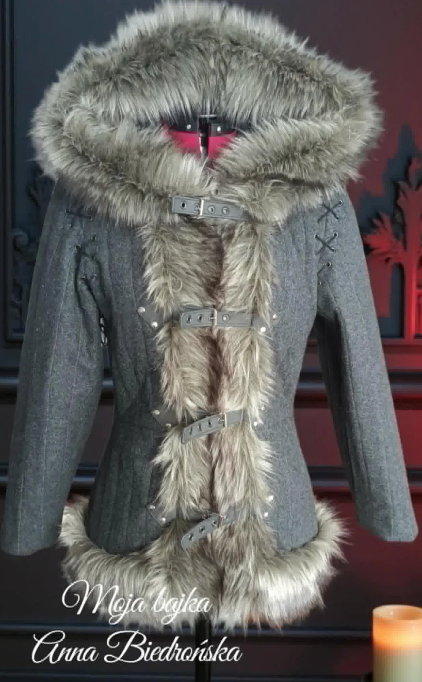 Gray wool coat with large fluffy fur collar and trim, displayed on a dress form mannequin with pink lighting background