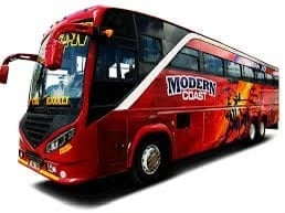 Red double-decker tour bus with Modern Coach branding, photographed against a white background