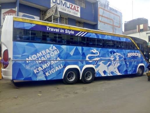 Modern Coast double-decker bus in blue and white livery