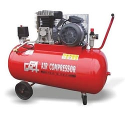 Red GGA electric air compressor with large horizontal tank, electric motor and wheels on white background
