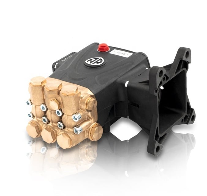 High-pressure pump with brass manifold and black motor assembly mounted on white background