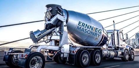 ErnnieG Masonry concrete mixer truck parked in an industrial yard