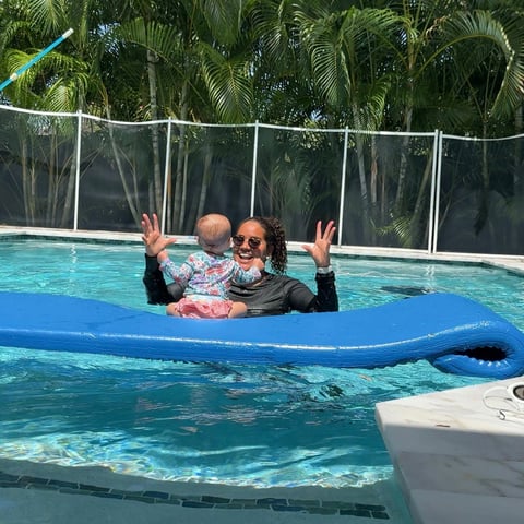 Infant swim lesson photo 7 — adult instructor teaching baby in a private pool