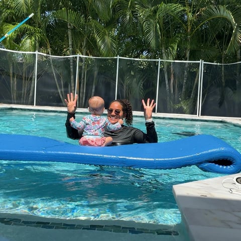 Infant swim lesson photo 6 — adult instructor teaching baby in a private pool