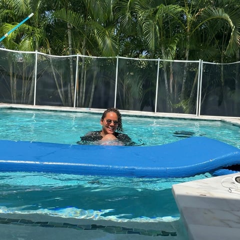 Infant swim lesson photo 9 — adult instructor teaching baby in a private pool