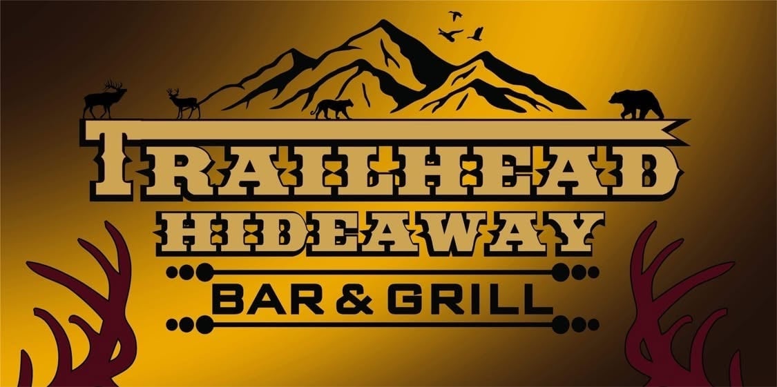 Trailhead Hideaway Bar and Grill logo featuring mountains, wildlife silhouettes, and antlers on a gold background