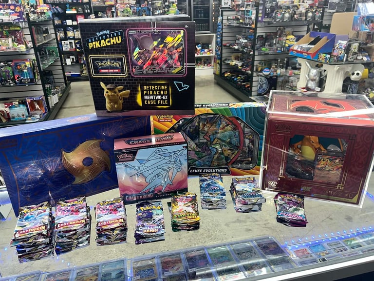 Pokemon trading card display at a shop counter with sealed booster packs, collection boxes, and Pikachu promotional materials