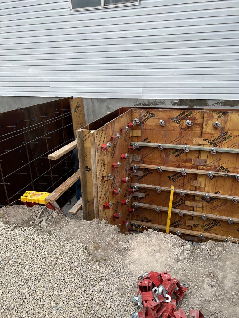 Custom-built wooden gate with metal bars and hardware