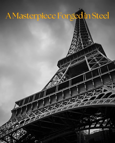 The Eiffel Tower photographed from below in black and white, with gold text reading A Masterpiece Forged in Steel at the top