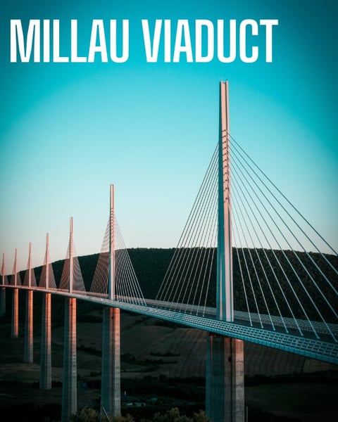 Millau Viaduct cable-stayed bridge with tall white pylons and suspension cables against turquoise sky