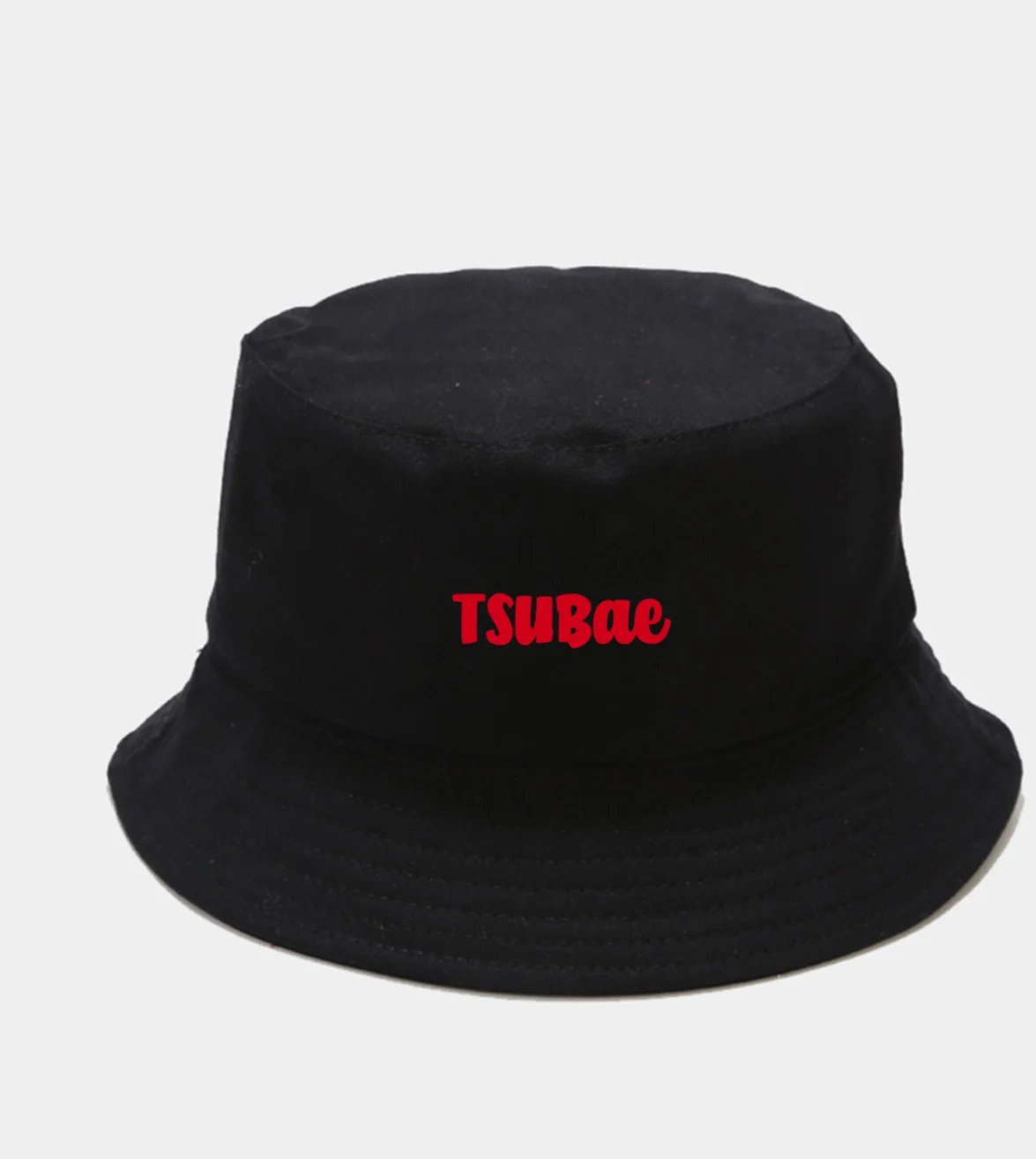 Black bucket hat with red TSUBae text embroidered on front