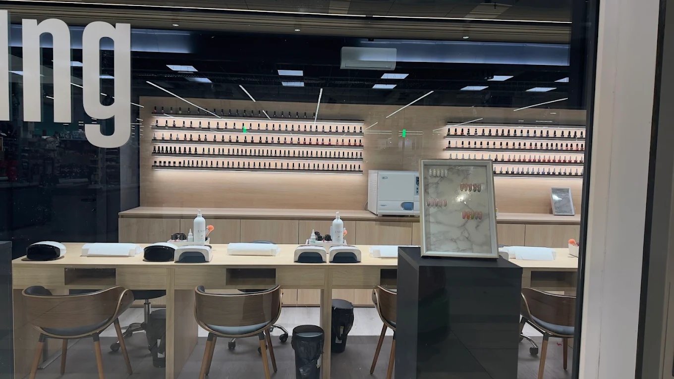 Interior of modern retail store with product display wall