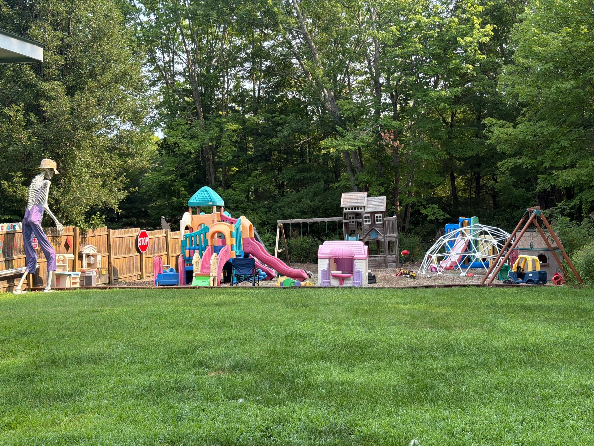 Fenced outdoor playground at Mother Goose Day Care in Newton, New Hampshire