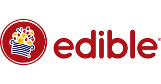 Edible logo featuring a red circular icon with a stylized popcorn container and the word edible in dark red text
