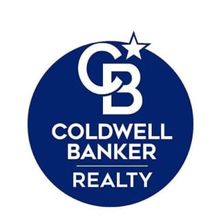 Coldwell Banker Realty logo with white CB initials and star on dark blue circular background