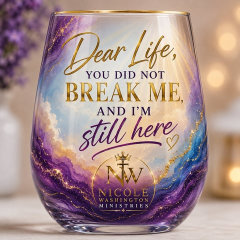 Decorative stemless wine glass with purple and blue swirl watercolor design and I'm still here message