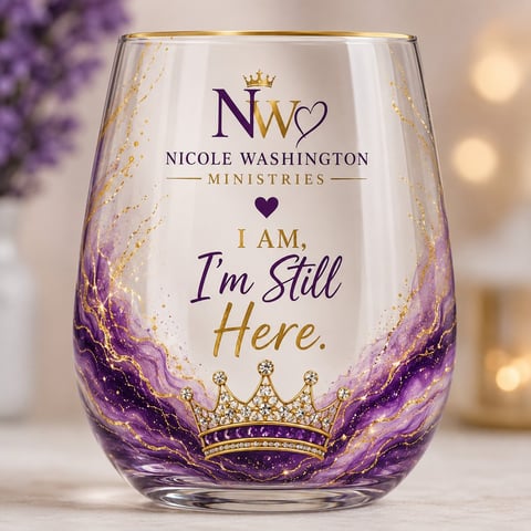 Purple and gold decorative wine glass with Nicole Washington Ministries logo and message I Am. Im Still Here.