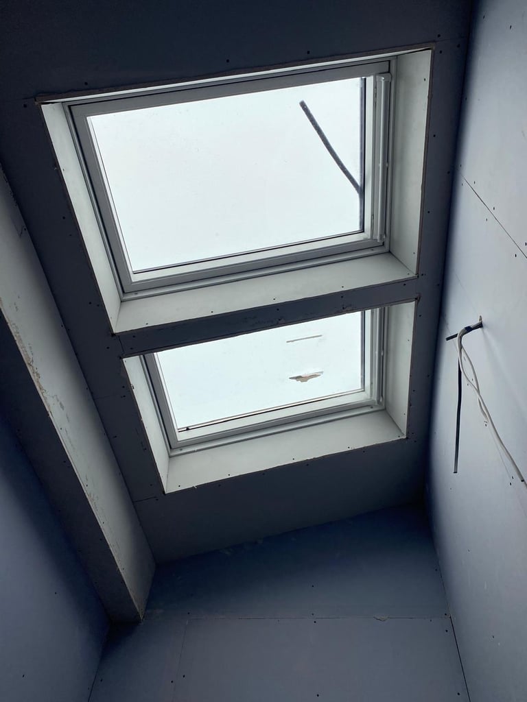 Timber stud partition detail around a boarded window or skylight reveal.