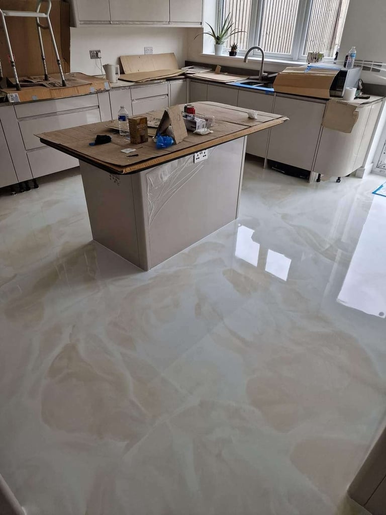 Metallic epoxy floor with high-gloss polyurea topcoat